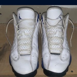 White and blue Jordan 12’s 
Decent condition